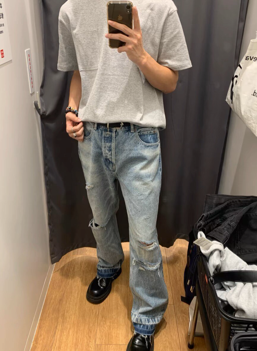 Distressed straight denim pants