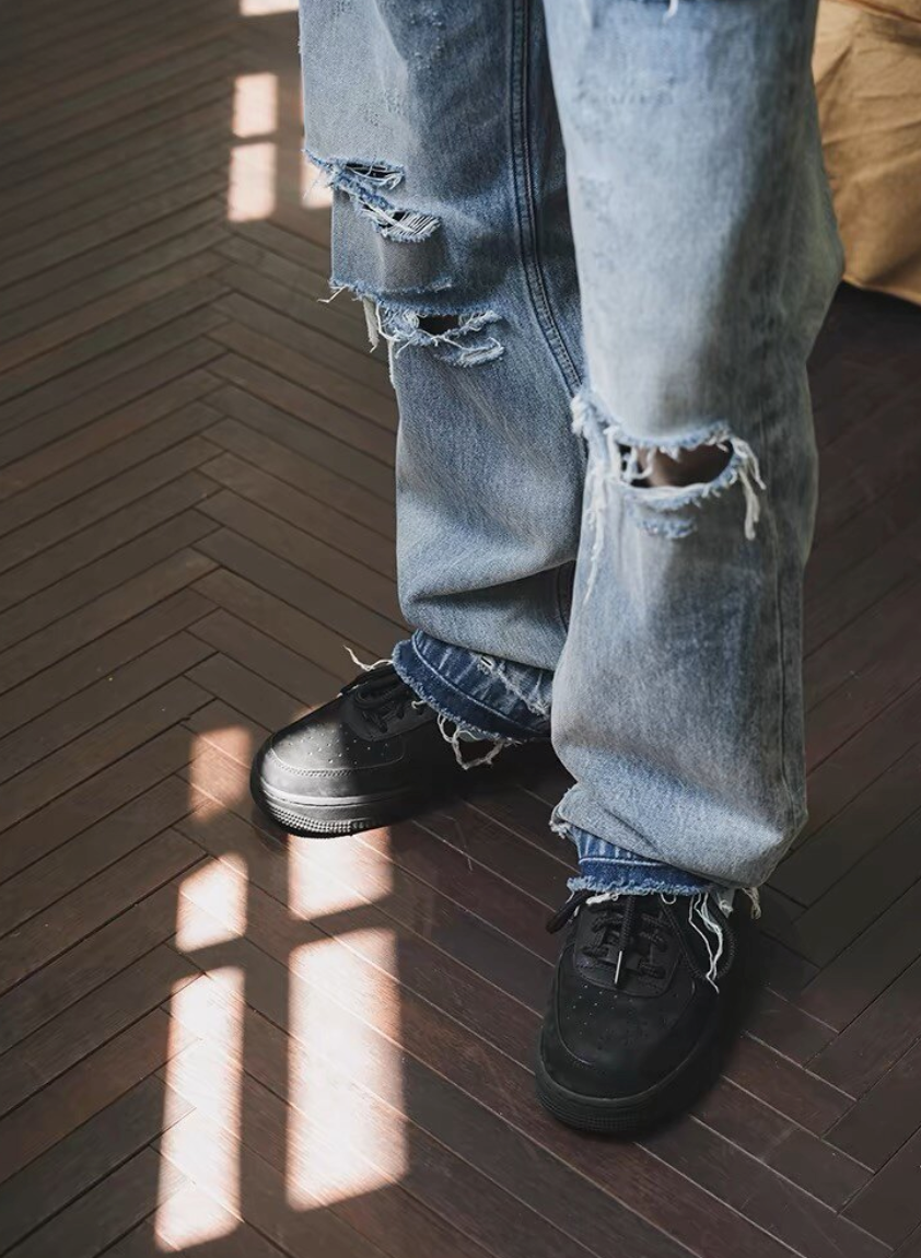 Distressed straight denim pants