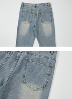 Distressed straight denim pants