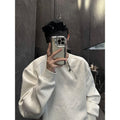 Diagonal half zip sweat trainer