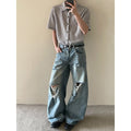 Distressed wide denim pants